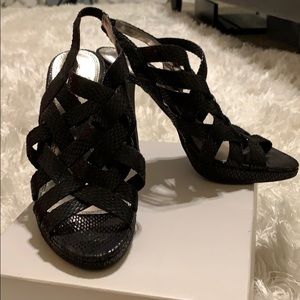 Black faux snake skin heels